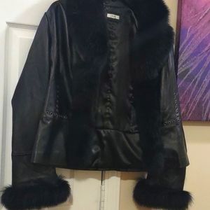 Rarely worn 100% leather jacket with fur